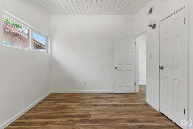2804 Haley St, Bakersfield, CA 93305 - spare room with wood finished floors, baseboards, and wood ceiling