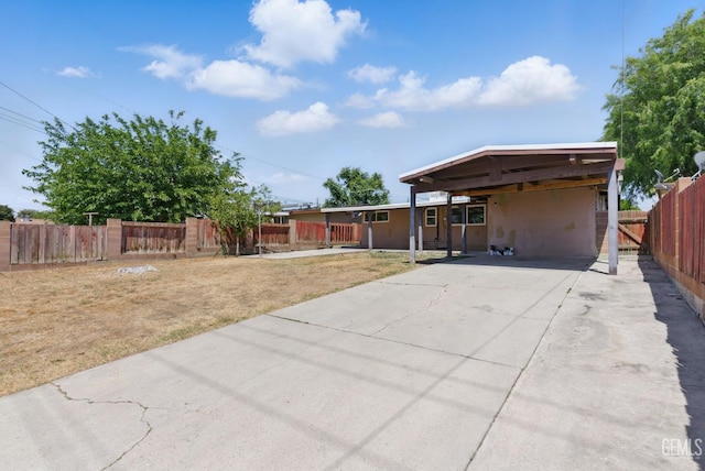 2804 Haley St, Bakersfield, CA 93305 - view of yard with driveway and a carport