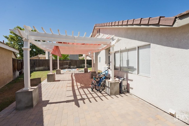 7519 Shadow Wells St, Bakersfield, CA 93313 - fenced backyard with a pergola and a patio