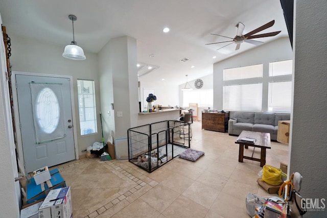 7519 Shadow Wells St, Bakersfield, CA 93313 - entryway with ceiling fan, light tile patterned floors, and high vaulted ceiling