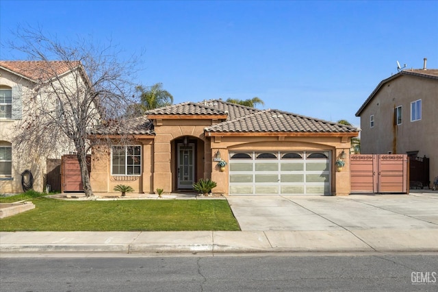 view of front of home with a tile roof, driveway, an attached garage, and stucco siding