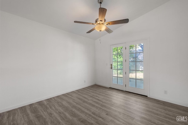 1224 N Mayflower Cir, Ridgecrest, CA 93555 - empty room with lofted ceiling, baseboards, a ceiling fan, and wood finished floors