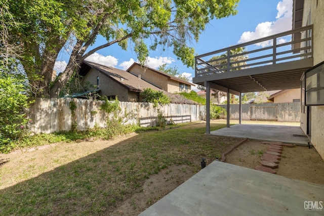 1224 N Mayflower Cir, Ridgecrest, CA 93555 - view of yard with a patio, a wooden deck, and a fenced backyard
