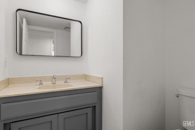 1224 N Mayflower Cir, Ridgecrest, CA 93555 - bathroom featuring toilet and vanity
