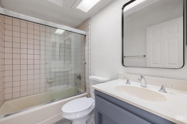 1224 N Mayflower Cir, Ridgecrest, CA 93555 - bathroom with toilet, vanity, and shower / bath combination with glass door