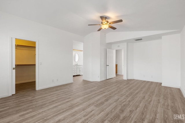 1224 N Mayflower Cir, Ridgecrest, CA 93555 - unfurnished bedroom with baseboards, light wood finished floors, visible vents, and vaulted ceiling