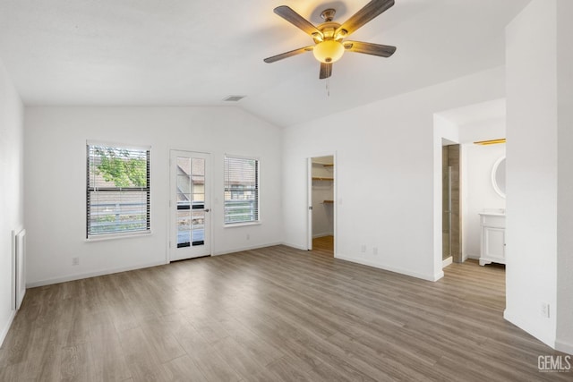 1224 N Mayflower Cir, Ridgecrest, CA 93555 - unfurnished bedroom with baseboards, vaulted ceiling, visible vents, and wood finished floors