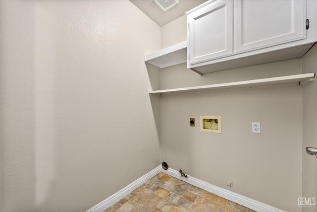 10318 Roehampton Ave, Bakersfield, CA 93312 - washroom featuring gas dryer hookup, washer hookup, electric dryer hookup, cabinet space, and light stone finish flooring