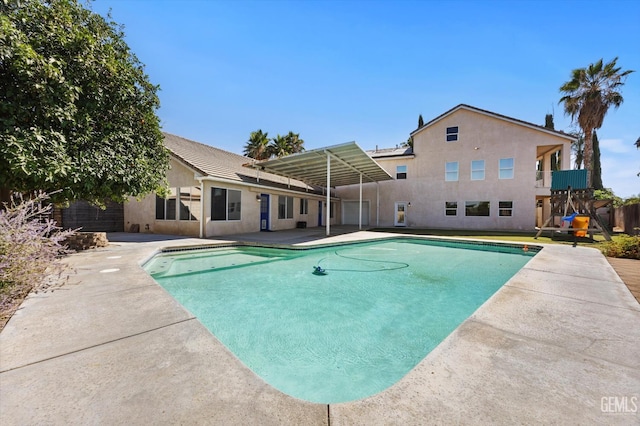 10318 Roehampton Ave, Bakersfield, CA 93312 - view of swimming pool with a patio area