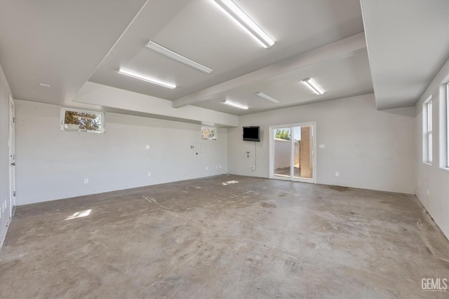 10318 Roehampton Ave, Bakersfield, CA 93312 - spare room featuring unfinished concrete flooring and healthy amount of natural light
