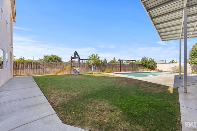 10318 Roehampton Ave, Bakersfield, CA 93312 - fenced backyard with a playground and a patio area