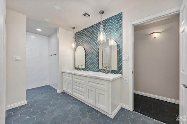 10318 Roehampton Ave, Bakersfield, CA 93312 - bathroom with double vanity, tile patterned floors, tiled shower, and recessed lighting