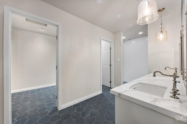 10318 Roehampton Ave, Bakersfield, CA 93312 - full bathroom with double vanity, recessed lighting, and tile patterned floors