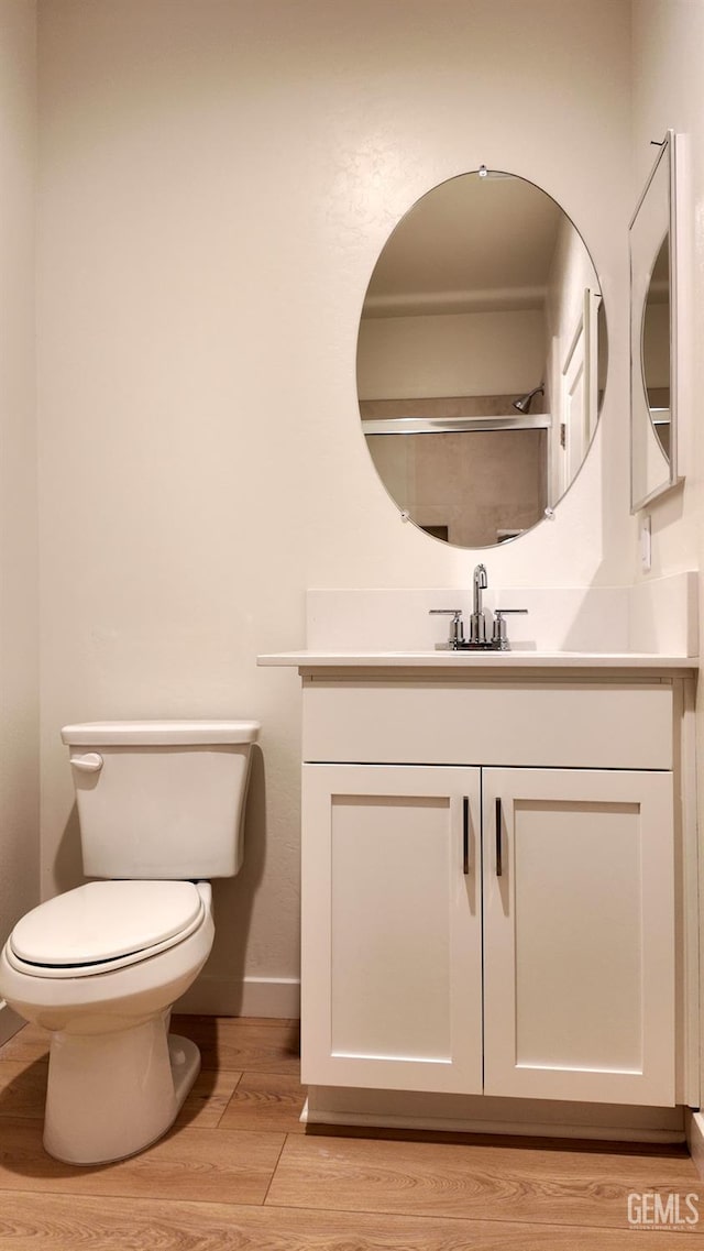 12801 Kinnick Ct, Bakersfield, CA 93311 - bathroom with wood finished floors and vanity