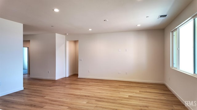 12801 Kinnick Ct, Bakersfield, CA 93311 - empty room with light wood finished floors and recessed lighting