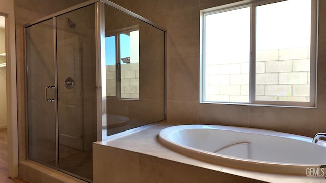 12801 Kinnick Ct, Bakersfield, CA 93311 - bathroom with a shower stall and a garden tub