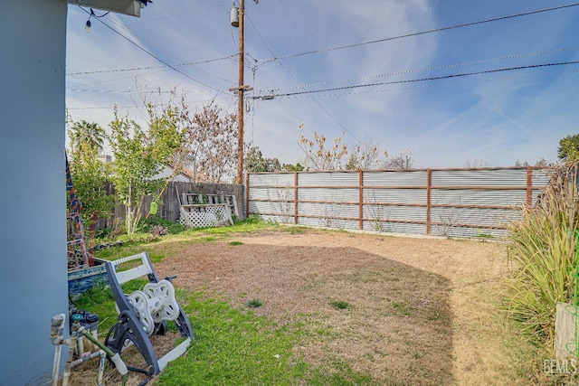 view of yard featuring fence