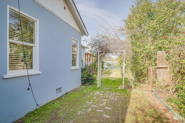 view of yard with fence