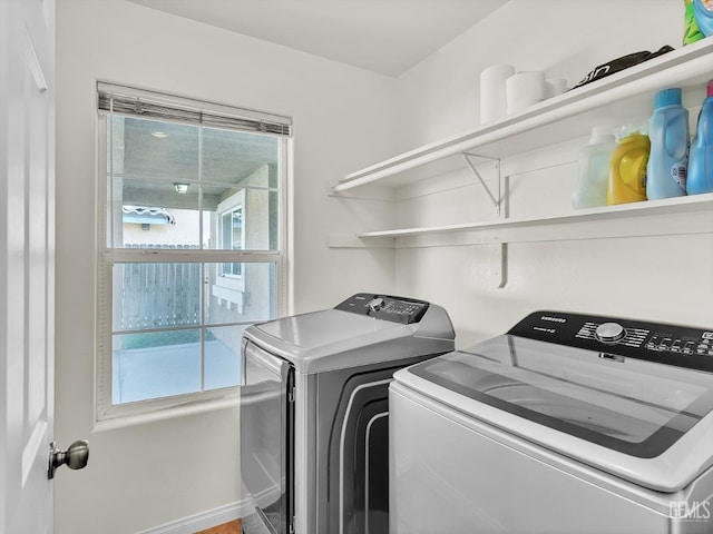 laundry area with washer and dryer and laundry area