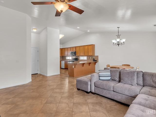 living room with light tile patterned flooring, high vaulted ceiling, baseboards, and ceiling fan with notable chandelier