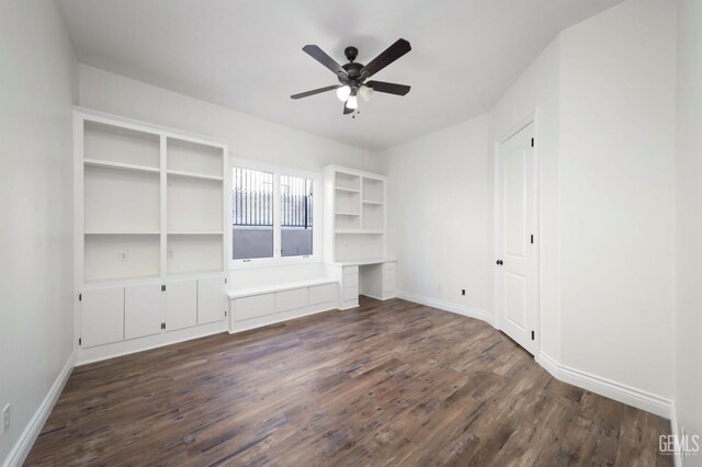 5507 Via Venezia, Bakersfield, CA 93306 - spare room with dark wood finished floors, a ceiling fan, and baseboards