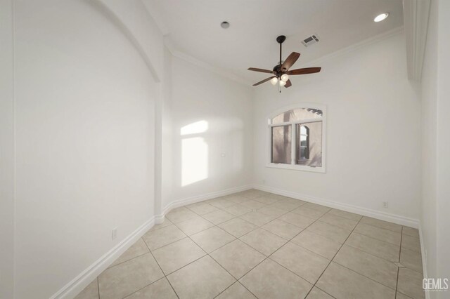 5507 Via Venezia, Bakersfield, CA 93306 - spare room featuring ornamental molding, healthy amount of natural light, a ceiling fan, light tile patterned floors, and baseboards