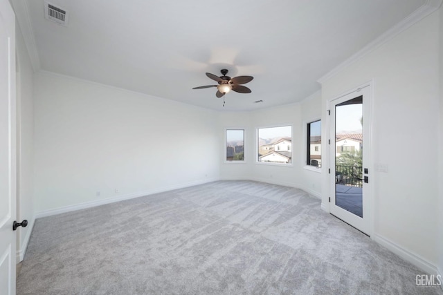 5507 Via Venezia, Bakersfield, CA 93306 - unfurnished room with carpet, crown molding, a ceiling fan, and baseboards