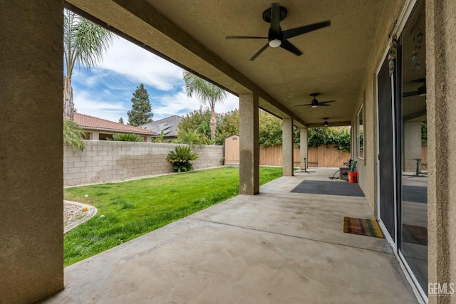 9310 Via Catania, Bakersfield, CA 93312 - view of patio / terrace featuring a ceiling fan and a fenced backyard