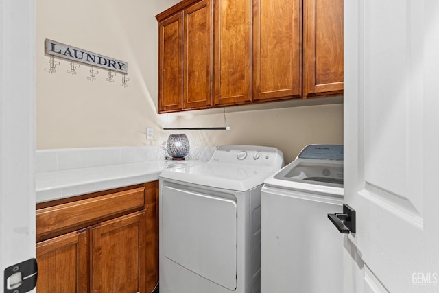 9310 Via Catania, Bakersfield, CA 93312 - washroom featuring separate washer and dryer and cabinet space