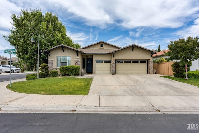 9310 Via Catania, Bakersfield, CA 93312 - ranch-style house featuring stucco siding, fence, a garage, driveway, and a front yard