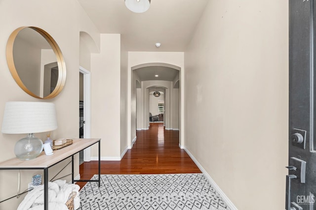 9310 Via Catania, Bakersfield, CA 93312 - hall with wood finished floors, baseboards, and arched walkways