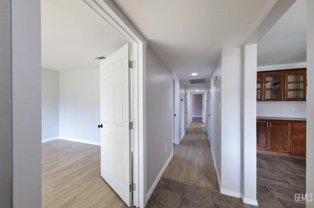 2800 S Real Rd, Bakersfield, CA 93309 - hallway featuring baseboards, recessed lighting, and wood finished floors