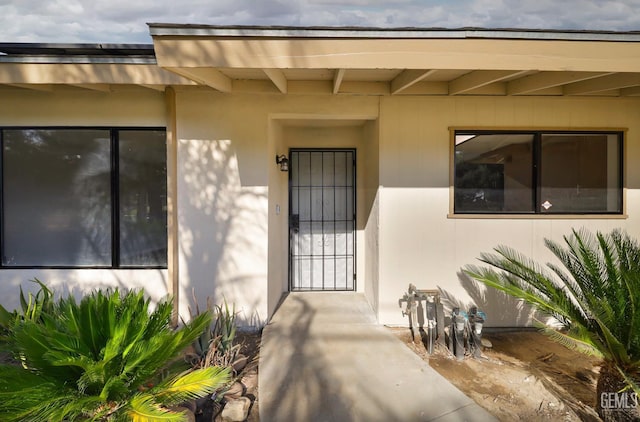 2800 S Real Rd, Bakersfield, CA 93309 - doorway to property featuring stucco siding