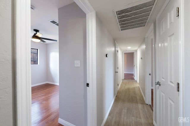 2800 S Real Rd, Bakersfield, CA 93309 - corridor featuring light wood-type flooring and baseboards