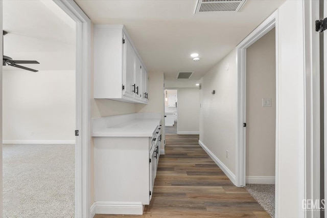 5100 Ruth Ct, Bakersfield, CA 93308 - corridor featuring baseboards and wood finished floors