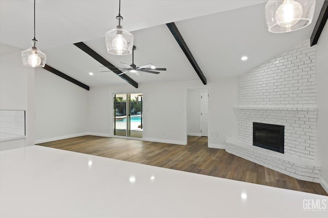 5100 Ruth Ct, Bakersfield, CA 93308 - unfurnished living room with ceiling fan, wood finished floors, a brick fireplace, and recessed lighting