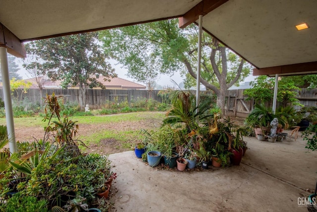 view of yard with a fenced backyard and a patio