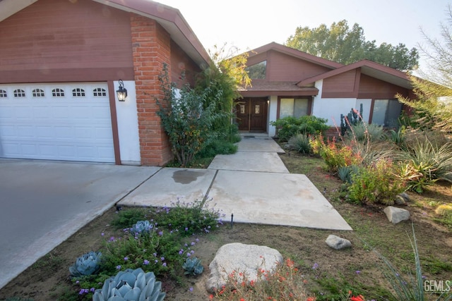 view of front of home with brick siding