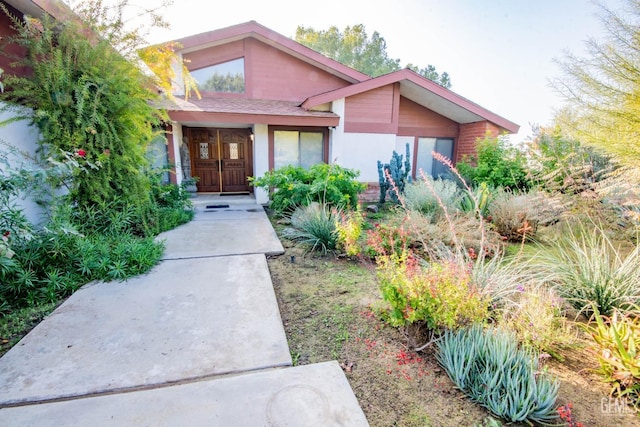 view of front of home featuring stucco siding