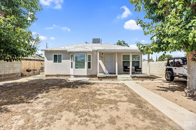 1900 La France Dr, Bakersfield, CA 93304 - view of front of home featuring stucco siding and a porch