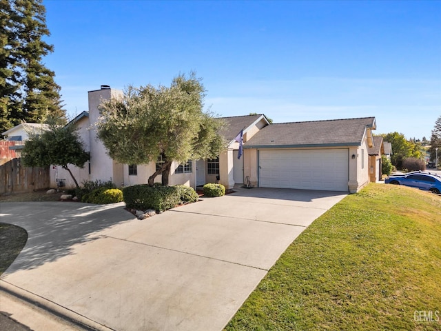 6305 Wolfe Creek Dr, Bakersfield, CA 93306 - view of front of house featuring stucco siding, driveway, an attached garage, and a chimney