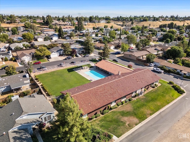6305 Wolfe Creek Dr, Bakersfield, CA 93306 - aerial perspective of suburban area featuring a pool