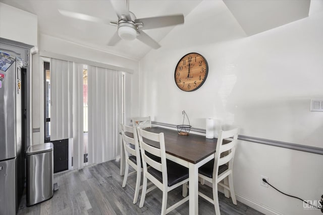 6305 Wolfe Creek Dr, Bakersfield, CA 93306 - dining area with a ceiling fan, wood finished floors, and vaulted ceiling