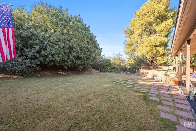 view of yard featuring fence