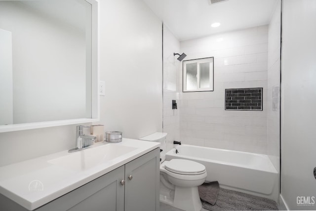 full bath featuring  shower combination, visible vents, toilet, and vanity