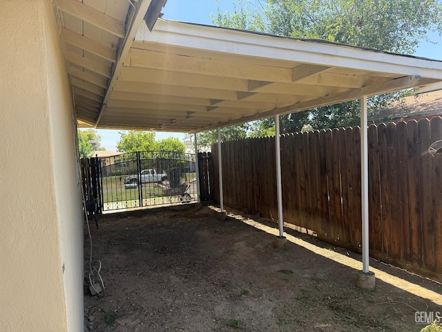 1708 Bower St, Bakersfield, CA 93305 - view of patio featuring a carport