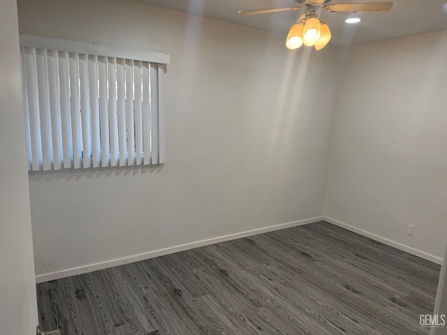 1708 Bower St, Bakersfield, CA 93305 - unfurnished room with dark wood-type flooring and ceiling fan