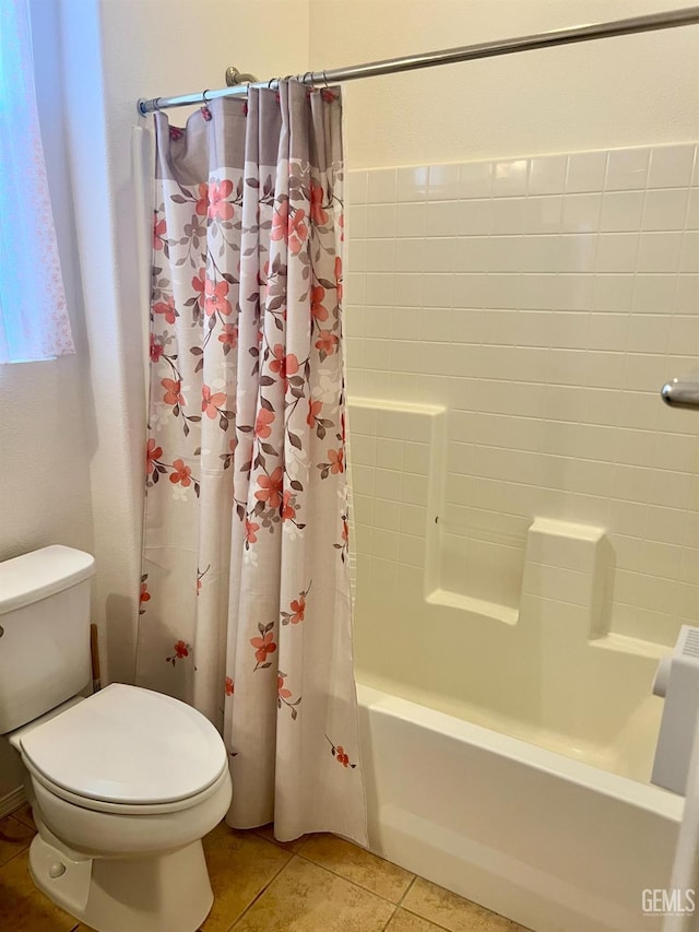 9909 Stockholm Pl, Bakersfield, CA 93306 - bathroom with tile patterned flooring, shower / bath combination with curtain, and toilet
