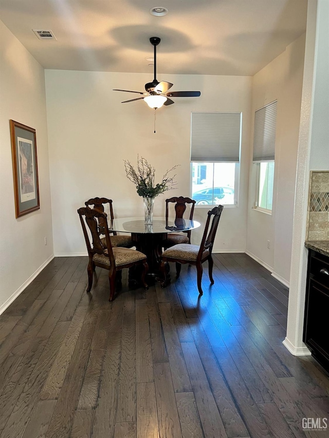 9909 Stockholm Pl, Bakersfield, CA 93306 - dining room featuring dark wood-type flooring and ceiling fan
