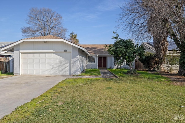 ranch-style house featuring a garage and a front yard